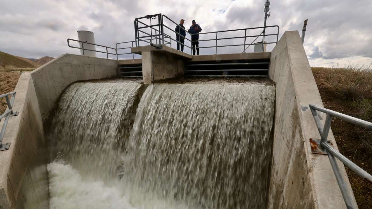 Water begins to flow at Point of the Mountain in Draper as the Central Utah Water Conservancy District redirects it to the Great Salt Lake. (Scott G. Winterton, Deseret News)